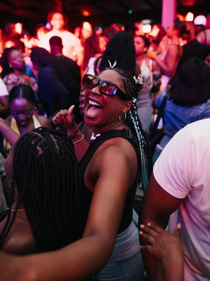 Guest laughing on the dance floor at Walako Pub